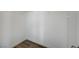 Walk-in closet with wood-look floors and white walls at 5861 Secret Island Dr, Las Vegas, NV 89139