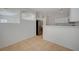 Well-lit kitchen features white cabinets and stainless steel refrigerator at 5861 Secret Island Dr, Las Vegas, NV 89139