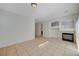 Well lit living room with a fireplace at 5861 Secret Island Dr, Las Vegas, NV 89139