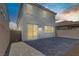 Spacious backyard featuring a paved patio area, offering a versatile outdoor space for various activities at 7256 Saxby Ave, Las Vegas, NV 89113