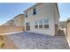 Backyard featuring a brick-paved patio, offering a low-maintenance outdoor space for relaxation at 7256 Saxby Ave, Las Vegas, NV 89113