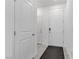 Clean and bright entryway featuring white doors and neutral decor at 7256 Saxby Ave, Las Vegas, NV 89113