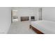 Bright main bedroom boasts plush carpet, modern furniture, and a neutral color palette at 7256 Saxby Ave, Las Vegas, NV 89113