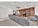 Spacious living room with custom built-ins, a large sectional sofa, recessed lighting, and coffered ceilings at 807 Canyon Greens Dr, Las Vegas, NV 89144