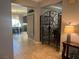 Hallway view showcasing the tile flooring, wrought iron, and open floor plan at 8209 Chapelle Ct, Las Vegas, NV 89131