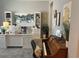 Well-lit home office featuring a desk, shelving, and a grand piano at 8209 Chapelle Ct, Las Vegas, NV 89131