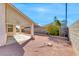 View of a well-maintained backyard with a covered patio and desert landscaping at 1035 Dodger Blue Ave, Las Vegas, NV 89123