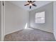 Bedroom featuring natural light, carpet, and a ceiling fan at 1035 Dodger Blue Ave, Las Vegas, NV 89123