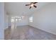 Expansive living room featuring tile floors, recessed lighting, and neutral color scheme at 1035 Dodger Blue Ave, Las Vegas, NV 89123