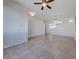 Bright living room with ceiling fan, recessed lighting, and tile flooring throughout at 1035 Dodger Blue Ave, Las Vegas, NV 89123