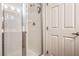 Modern bathroom features a glass-enclosed shower, white tiles, and sleek fixtures for a clean look at 10431 Kitty Joyce Ave, Las Vegas, NV 89129