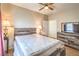 Nicely staged bedroom with ceiling fan and good natural light at 10431 Kitty Joyce Ave, Las Vegas, NV 89129