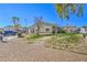 Well-maintained common area with grass, desert landscaping, and drought-resistant plants at 10431 Kitty Joyce Ave, Las Vegas, NV 89129