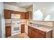 Well-lit kitchen featuring a gas range, dishwasher, and plenty of counter space at 10431 Kitty Joyce Ave, Las Vegas, NV 89129