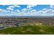 Aerial view showcasing the community park, playground, and surrounding residential area with city views at 10725 Wrigley Field Ave, Las Vegas, NV 89166