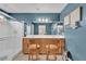 Modern bathroom featuring a glass enclosed shower, a double sink, and lots of storage at 10725 Wrigley Field Ave, Las Vegas, NV 89166