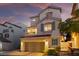 Charming two-story home with a spacious two-car garage, balcony, and inviting curb appeal at 10725 Wrigley Field Ave, Las Vegas, NV 89166