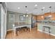 Open-concept kitchen and dining area with modern appliances and plenty of counter space at 10725 Wrigley Field Ave, Las Vegas, NV 89166