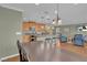 Bright kitchen with granite counters, stainless appliances, and center island with bar stool seating at 10725 Wrigley Field Ave, Las Vegas, NV 89166