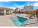 Beautiful community pool and spa area offering a relaxing retreat, complete with seating and lush landscaping at 10725 Wrigley Field Ave, Las Vegas, NV 89166