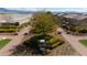 Overhead view of the Promenade entrance with sign surrounded by lush landscaping at 10725 Wrigley Field Ave, Las Vegas, NV 89166