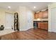 Convenient wet bar area featuring granite countertops, cabinetry, and a beverage refrigerator at 10725 Wrigley Field Ave, Las Vegas, NV 89166