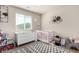 Lovely Bedroom with decorative accents and a patterned rug at 10922 Cambridge Lakes Ave, Las Vegas, NV 89166