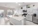 Kitchen with stainless steel appliances and an island at 10922 Cambridge Lakes Ave, Las Vegas, NV 89166