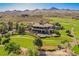 Aerial view of the golf course, clubhouse and luxury homes at 11 Belfair Ct, Henderson, NV 89052