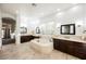 Spacious bathroom with double vanity sinks and a large tub at 11 Belfair Ct, Henderson, NV 89052