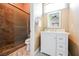 Neutral bathroom featuring marble vanity with storage and tiled shower at 11 Belfair Ct, Henderson, NV 89052