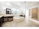 Bright bathroom with a tub, tiled floors, and a glass-enclosed shower at 11 Belfair Ct, Henderson, NV 89052