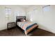 Bedroom with neutral carpet, striped blanket on bed, and windows at 11 Belfair Ct, Henderson, NV 89052