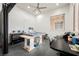 Well-lit studio with work tables, a window, and light gray floors at 11 Belfair Ct, Henderson, NV 89052