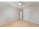 Bright bedroom showcasing wood-look floors and multiple entryways at 1105 Pawnee Ln, Henderson, NV 89015