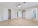 Large main bedroom featuring wood-look floors, walk-in closets, and an ensuite bathroom at 1105 Pawnee Ln, Henderson, NV 89015