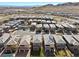 Aerial view showcases a residential neighborhood with well-maintained homes, and mountain views at 12525 Lylan Ridge St, Las Vegas, NV 89138