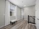 Cozy bedroom with natural light, a sleek bench by the window, and minimalist decor at 12525 Lylan Ridge St, Las Vegas, NV 89138