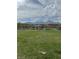 Expansive neighborhood park offering walking paths, green spaces, seating, and mountain views at 12525 Lylan Ridge St, Las Vegas, NV 89138