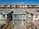 Two-story home with desert landscaping, mountain views, and attached garage at 12525 Lylan Ridge St, Las Vegas, NV 89138