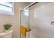 Bathroom featuring toilet and glass shower, and white subway tile at 1918 Molly Brook Dr # Lot 5, North Las Vegas, NV 89084