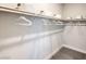 Walk in closet with rod and shelves featuring white wire basket at 1918 Molly Brook Dr # Lot 5, North Las Vegas, NV 89084