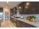 Kitchen featuring stainless steel appliances, tile backsplash, gas cooktop, and ample counter space at 1918 Molly Brook Dr # Lot 5, North Las Vegas, NV 89084