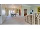 Inviting living room featuring neutral carpet, crown molding, and French doors leading to the outdoor area at 2246 Almart Cir, Henderson, NV 89014