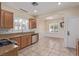 Kitchen featuring granite counters, stainless steel appliances, and updated backsplash at 2404 Garganey Ave, North Las Vegas, NV 89084