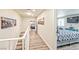 Hallway with wood laminate flooring leading to bedrooms at 2825 E Hacienda Ave, Las Vegas, NV 89120