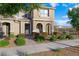 Charming two-story home with desert landscaping and covered entryway, shutters, and a tile roof at 2894 Via Firenze, Henderson, NV 89044