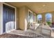 Welcoming covered patio with comfortable seating and scenic desert views at 2894 Via Firenze, Henderson, NV 89044