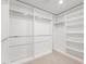 Spacious walk-in closet with ample shelving and closet rods at 2894 Via Firenze, Henderson, NV 89044