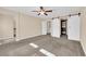 Bedroom with a ceiling fan, closet, and doors, creating a comfortable and functional space at 3064 Bicentennial Pkwy, Henderson, NV 89044